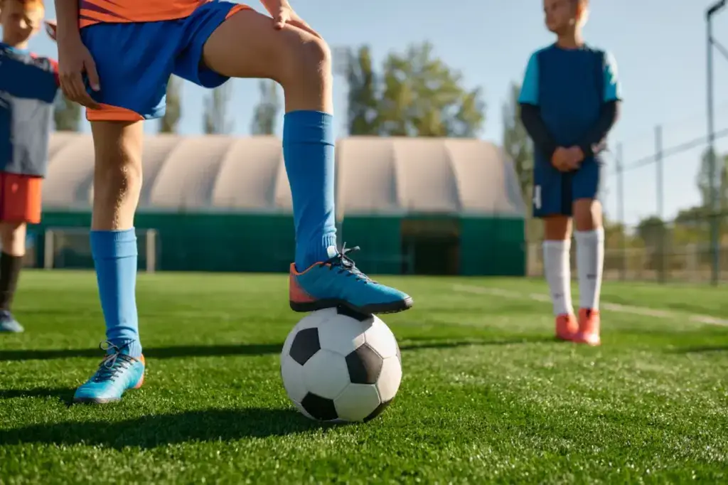 Young soccer players on a sunny field 2026 03 13 01 57 09 utc groot